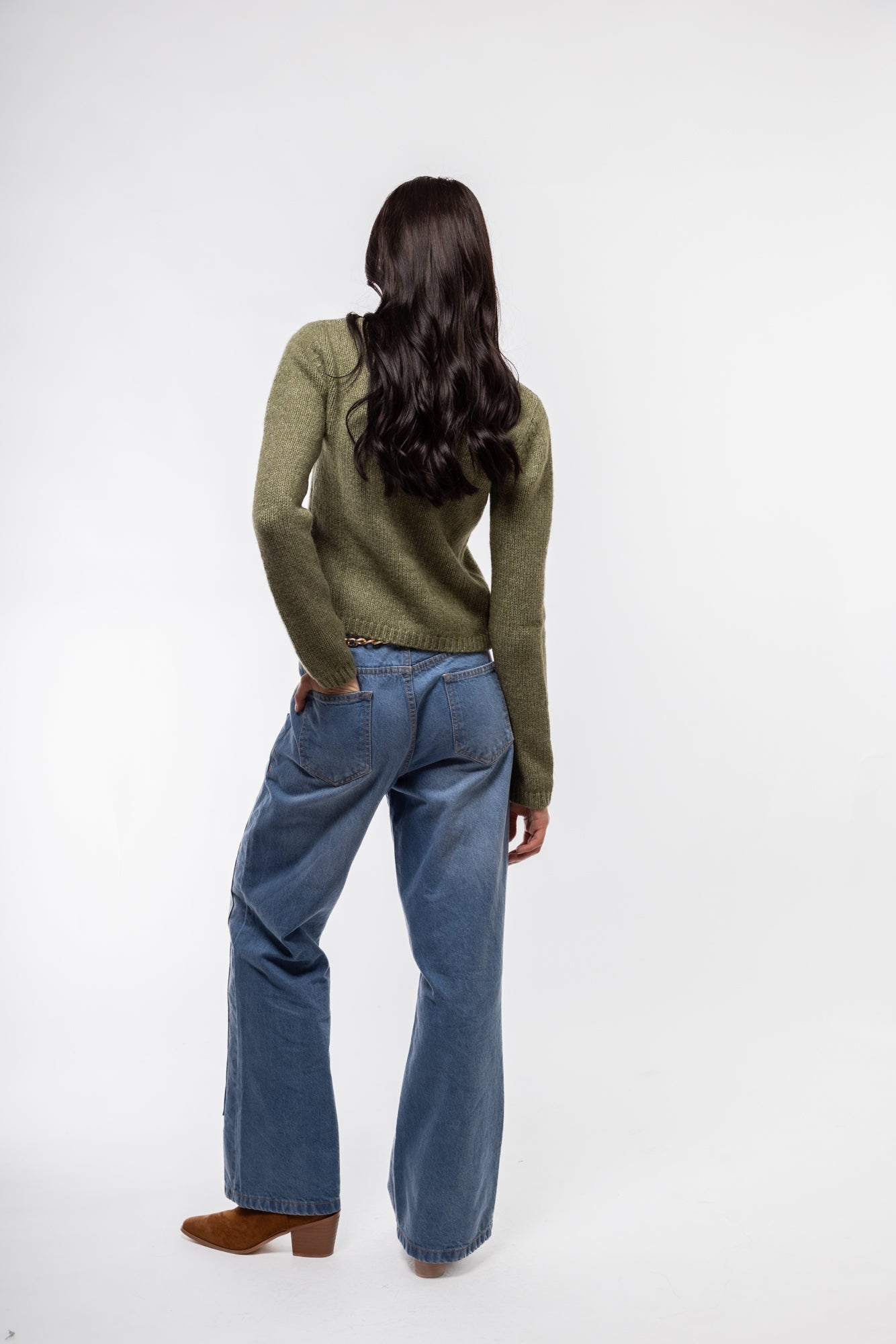 Back silhouette of lightweight olive knitwear