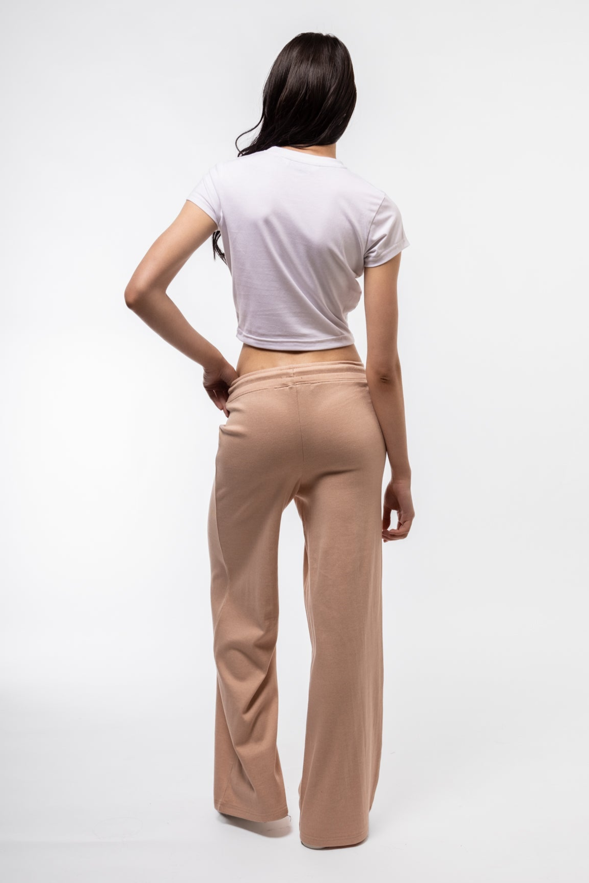 Back view of fitted Espresso Martini tee highlighting classic baby tee silhouette and soft texture