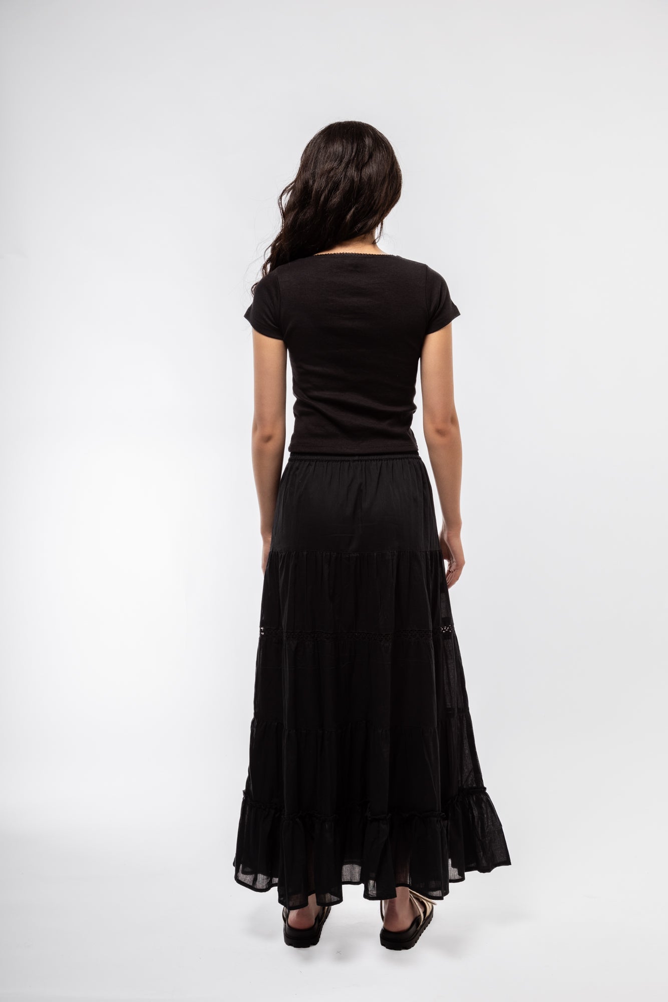 Black boho skirt rear image showing intricate embroidery and natural drape of fabric