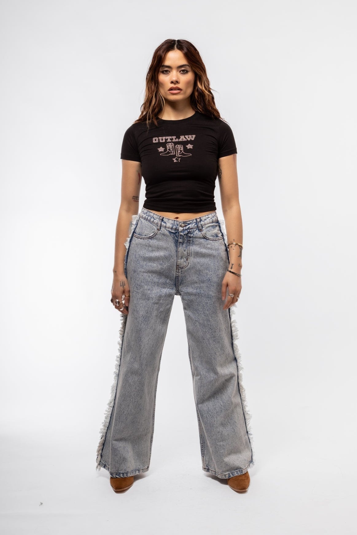 Close-up front image of rhinestone tee highlighting cowboy boot motif with dazzling rhinestones and soft fabric