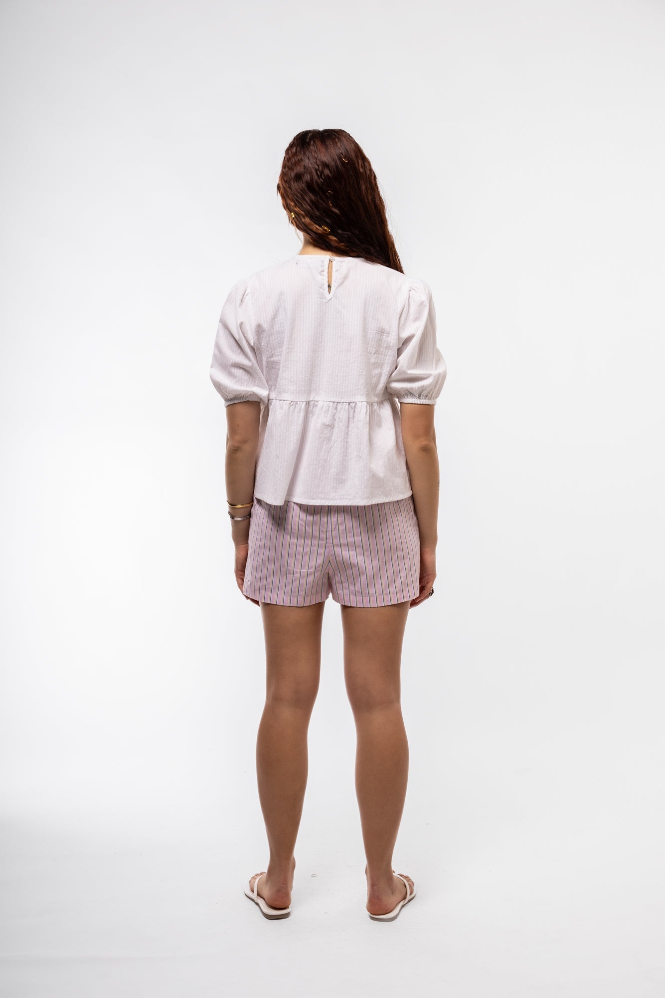 Cotton puff-sleeve top back view white top