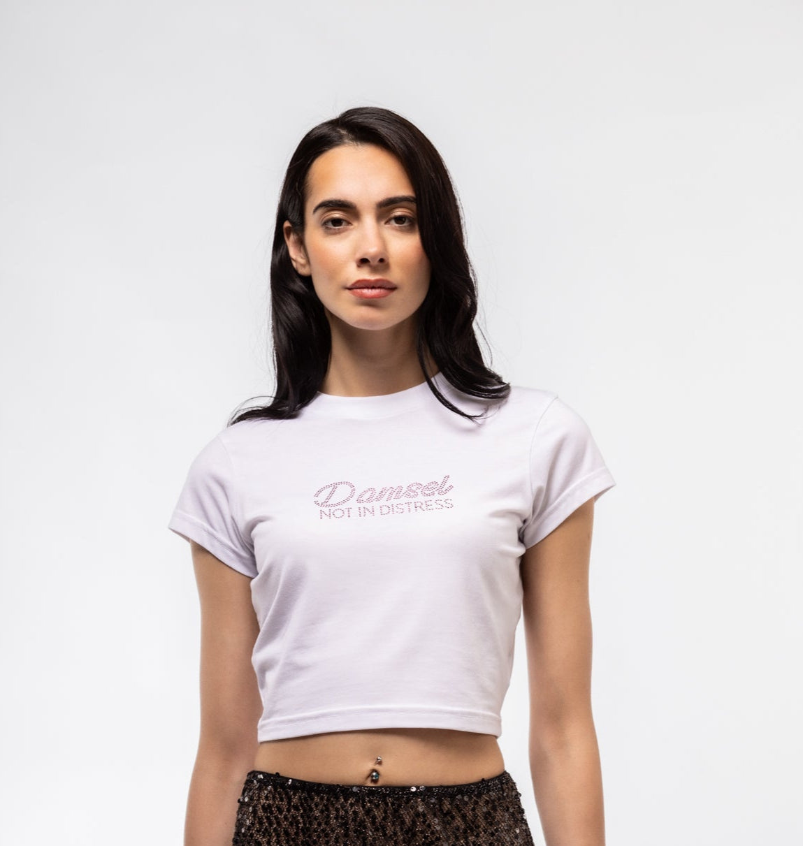 Front view of “Damsel Not in Distress” rhinestone tee featuring sparkling slogan and fitted silhouette
