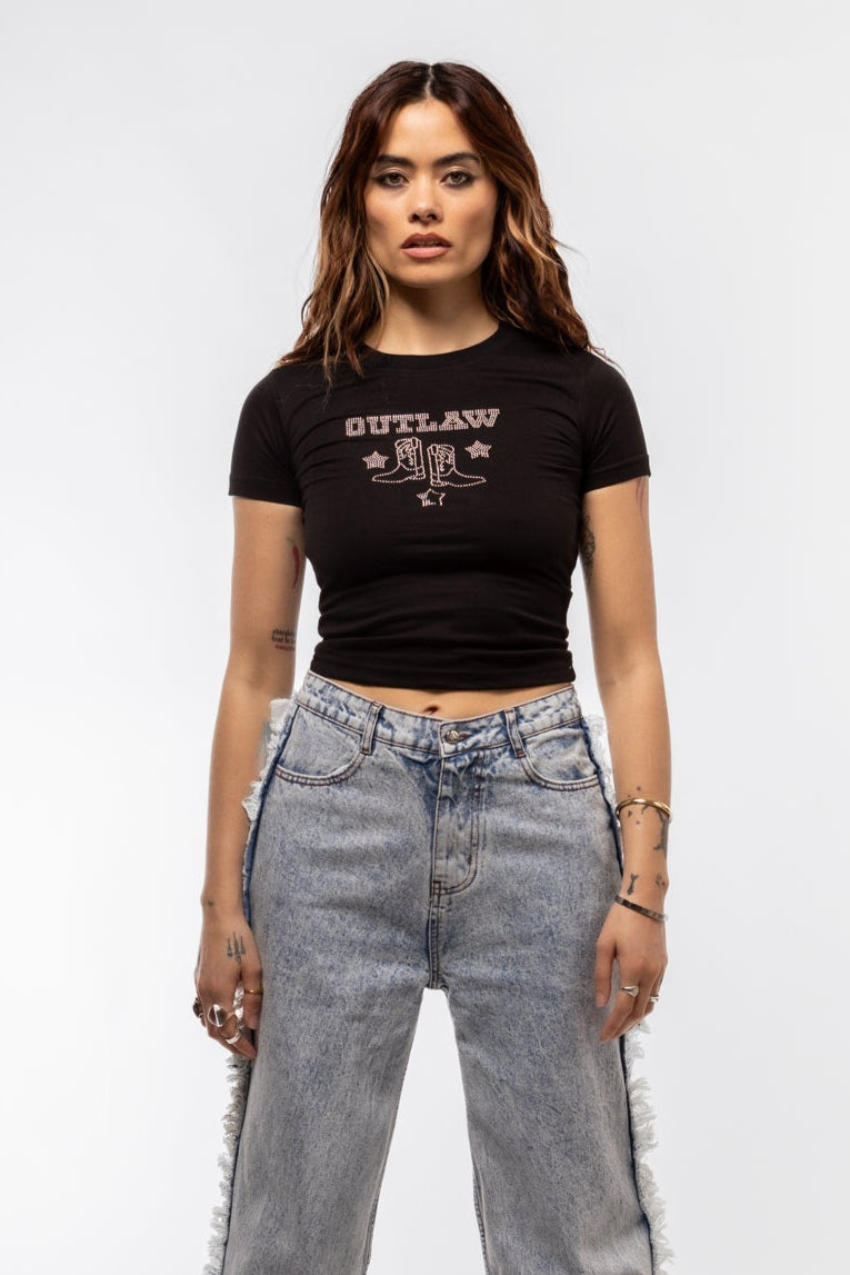 Front view of Outlaw Cowboy Boots rhinestone tee featuring sparkling cowboy boots graphic and bold “Outlaw” text