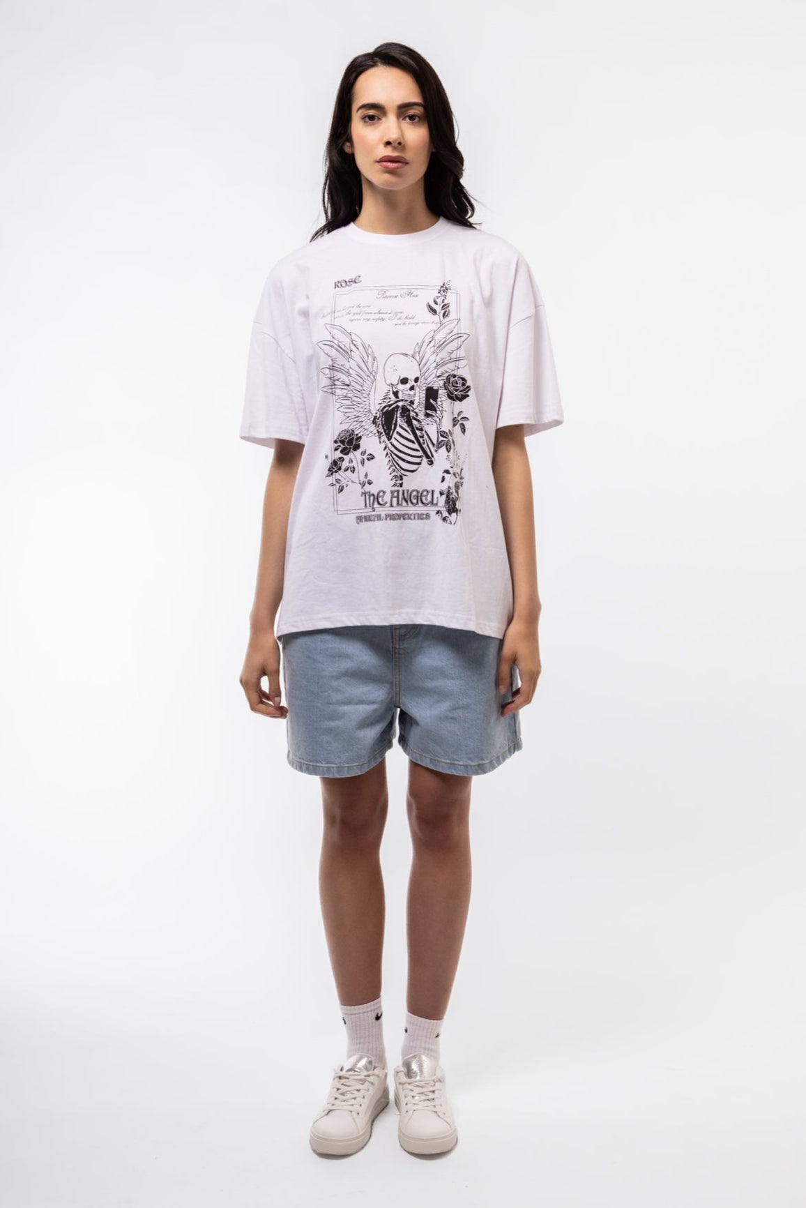 Front view of Selfie oversized tee featuring bold skeleton graphic taking a selfie and relaxed fit
