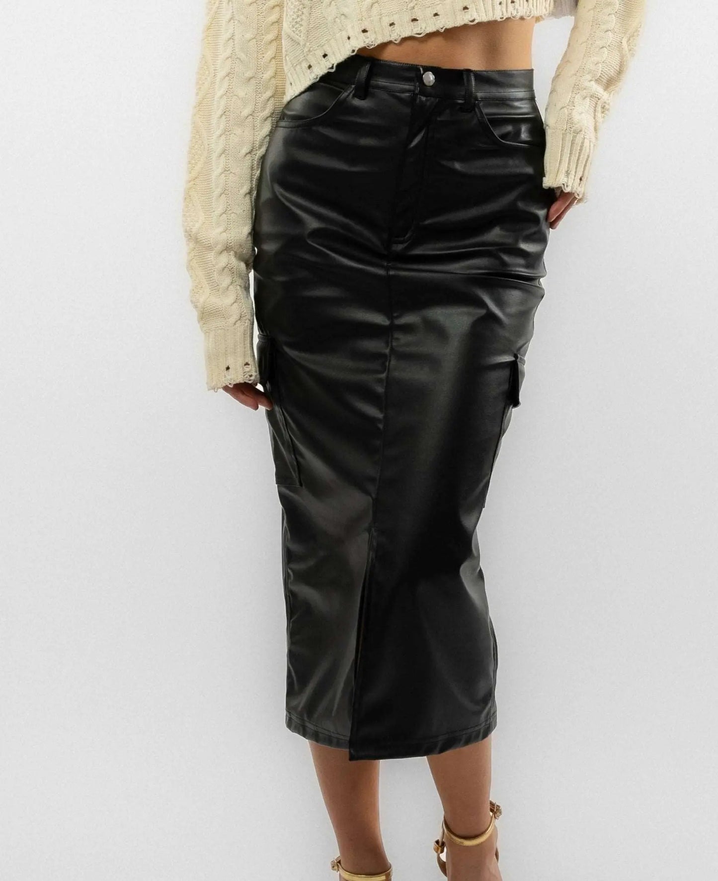 a woman wearing a faux leather skirt from silkroad daughters