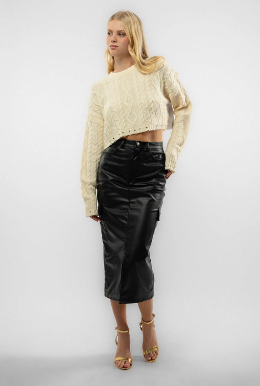 a woman wearing a faux leather skirt from silkroad daughters