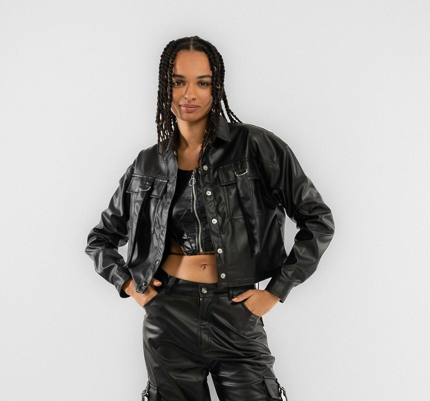 a woman wearing a black leather jacket