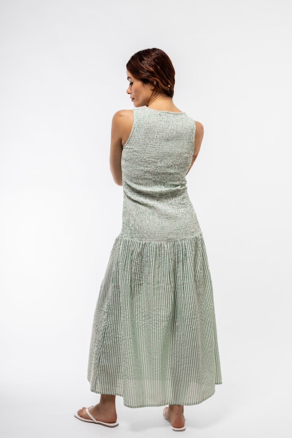Shirred bodice drop waist dress in pastel mint – back silhouette