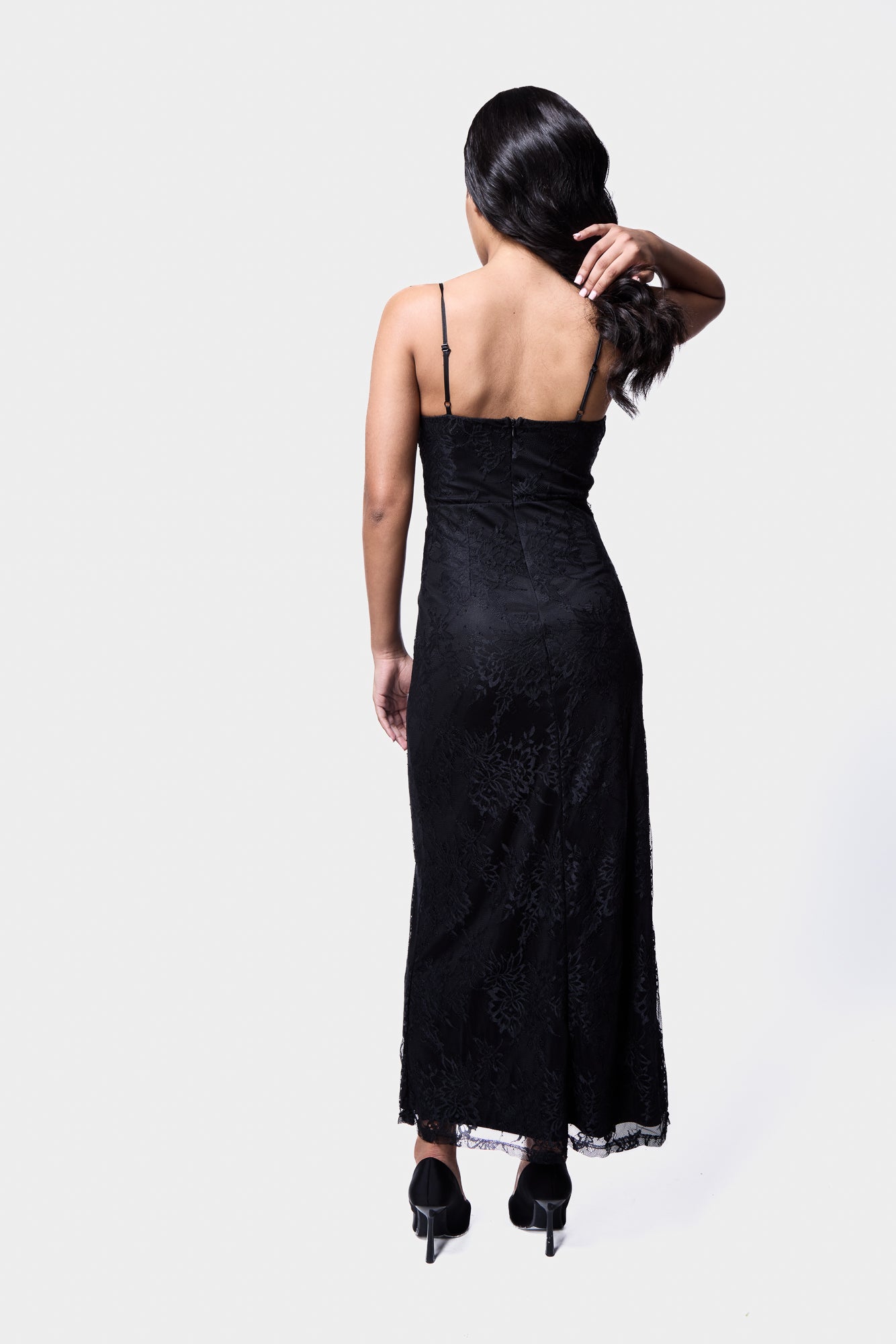 Stylish black lace midi slip dress perfect for evening wear or special occasions