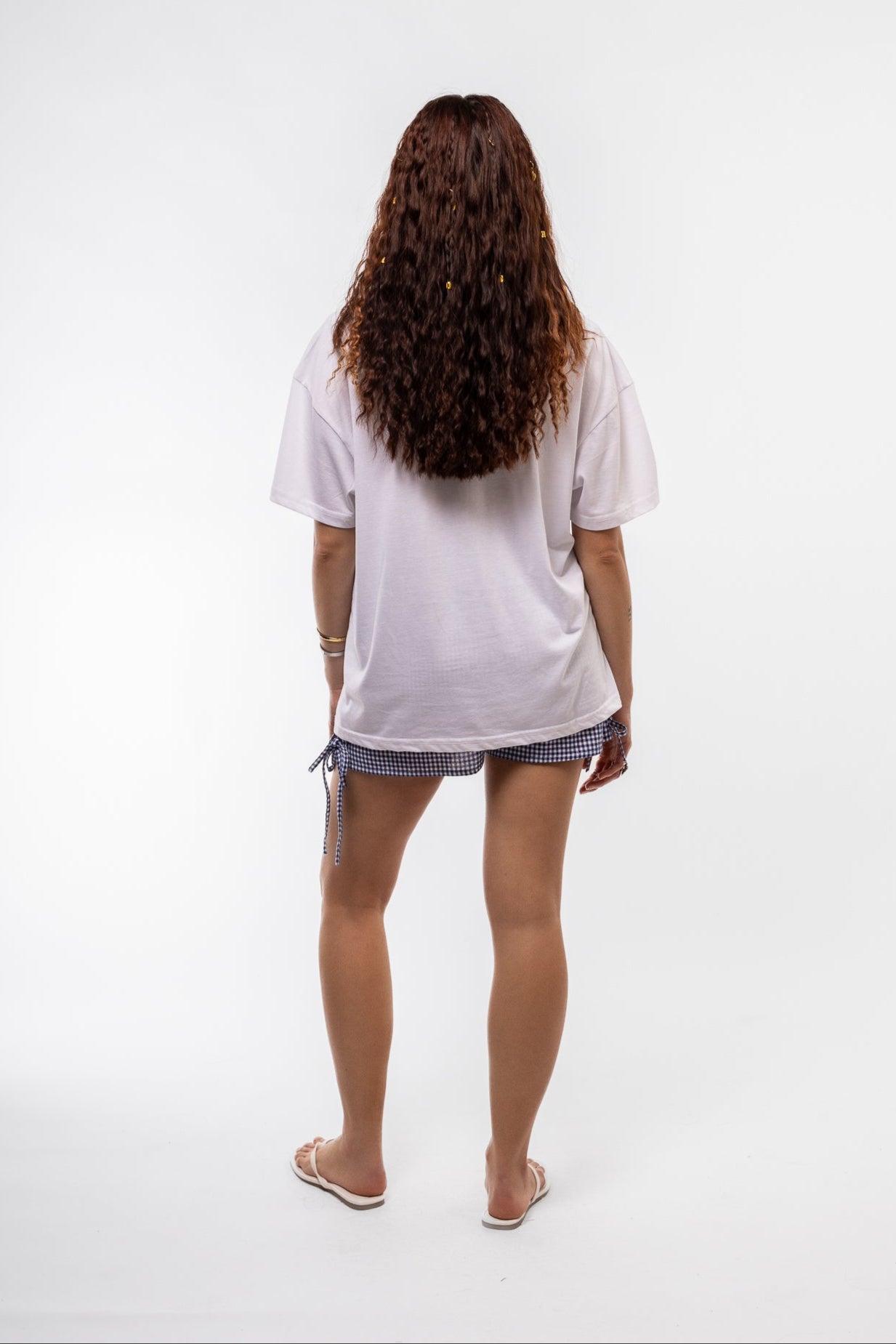 back view of the gingham shorts with side bows