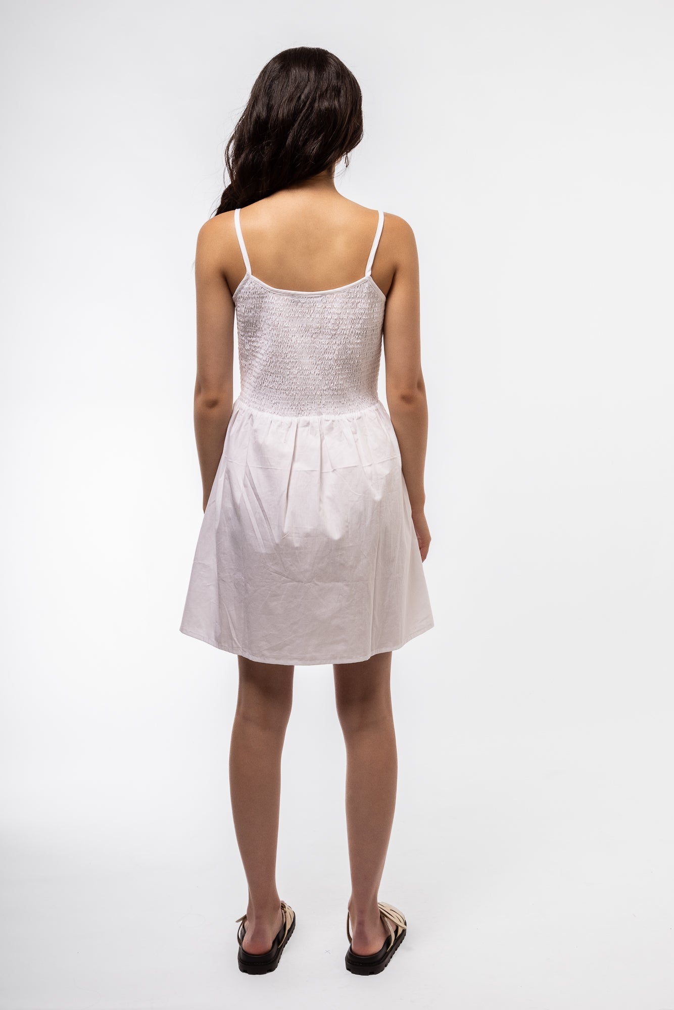 back view of the white shirring v cami dress