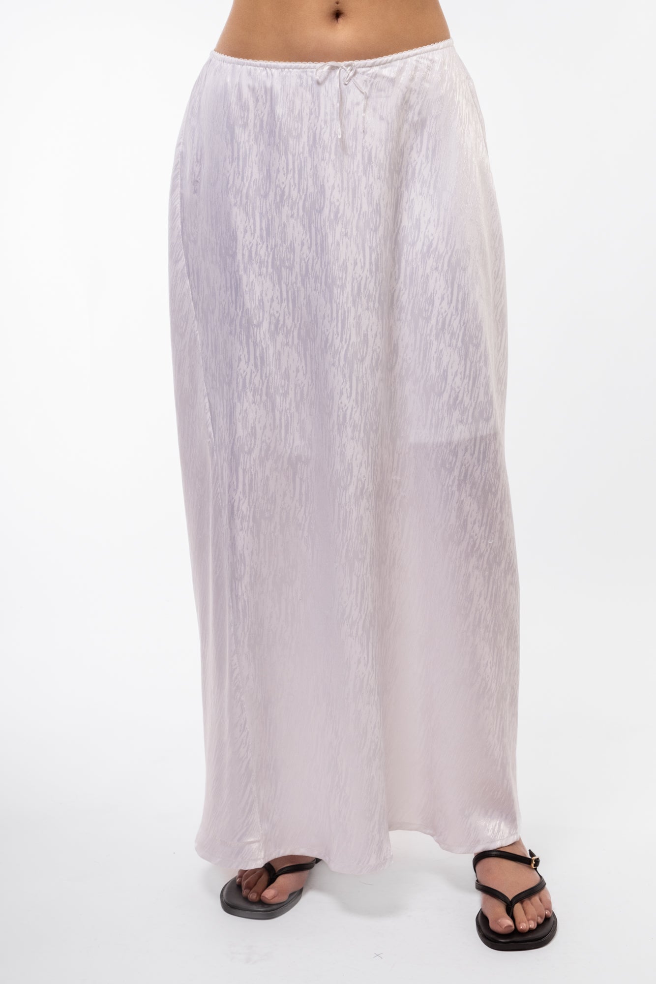 detail of the white jacquard midi skirt