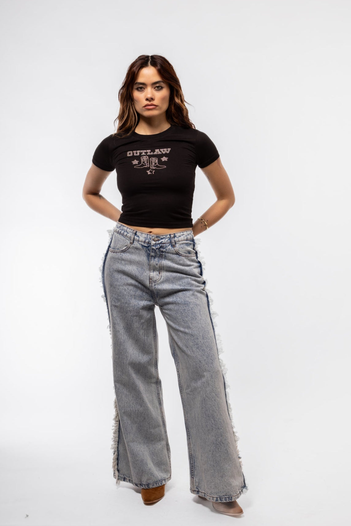 front view of the denim fringe jeans
