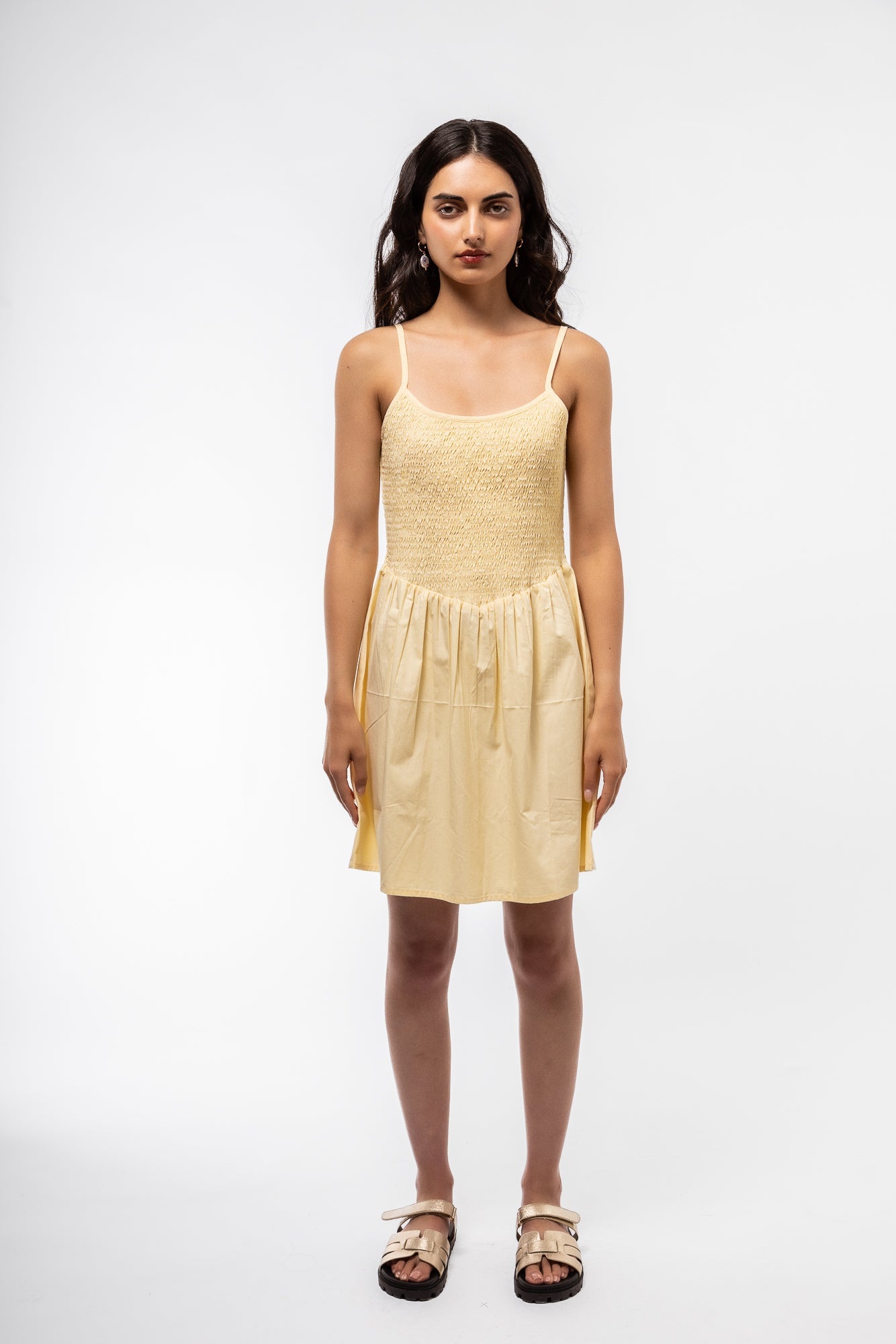 front view of the yellow shirring v mini dress