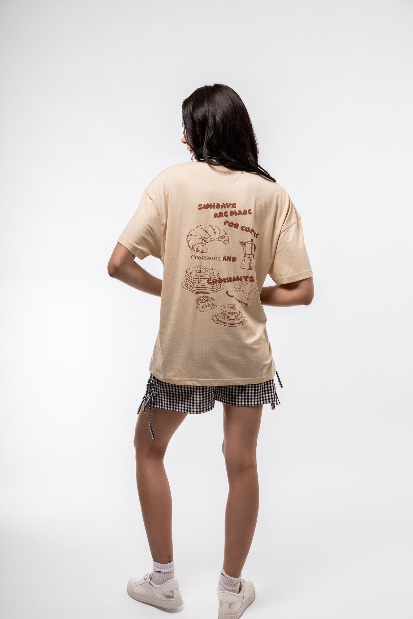 side view of the black gingham shorts with side detail
