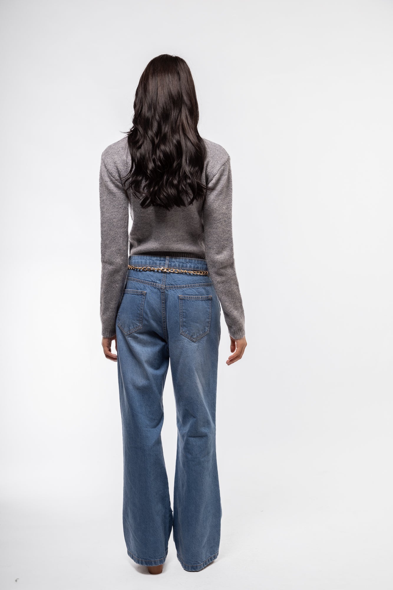 Back profile of grey button-up cardigan – relaxed fit

