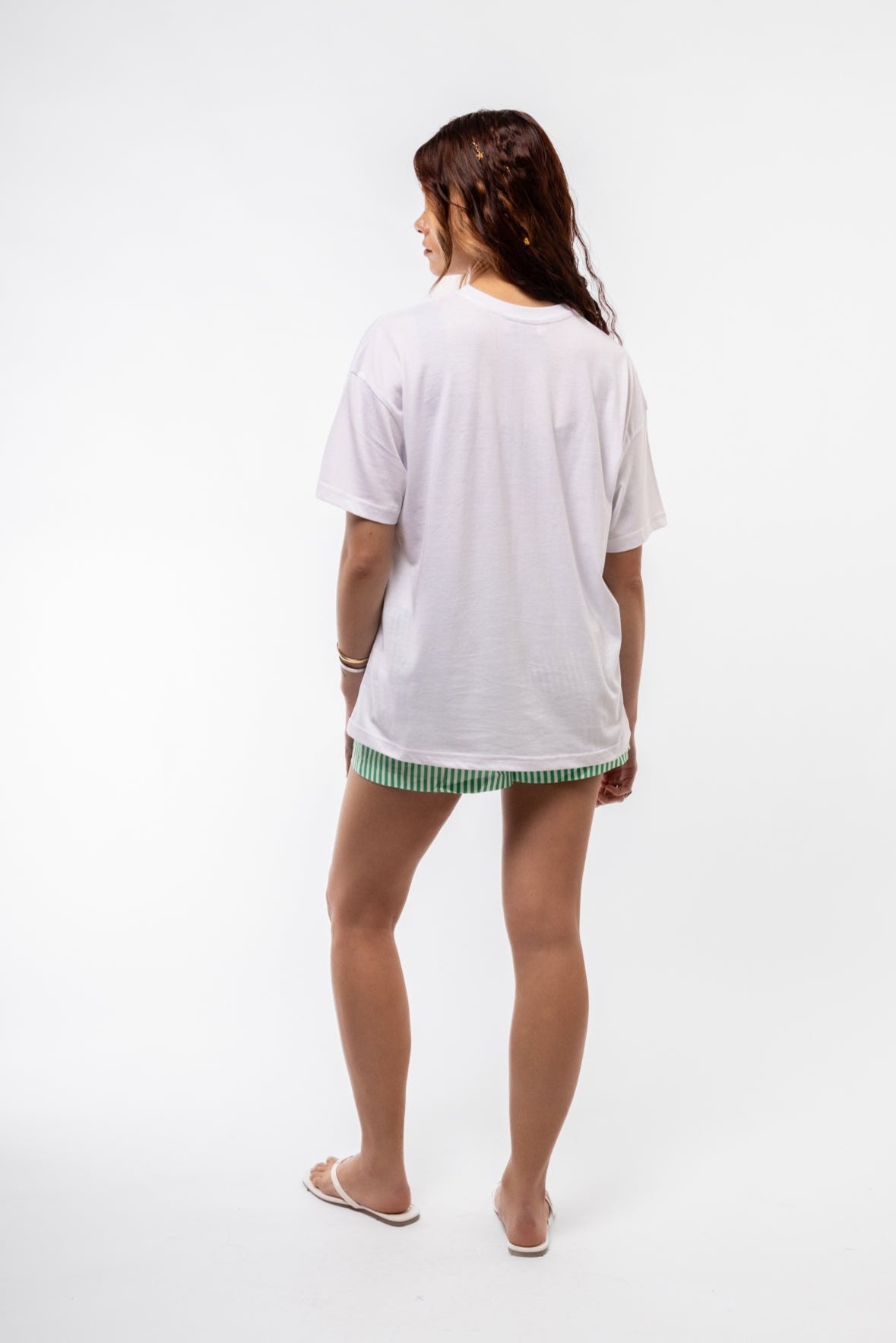 Back view of Cherry oversized tee featuring clean, plain white back and relaxed fit

