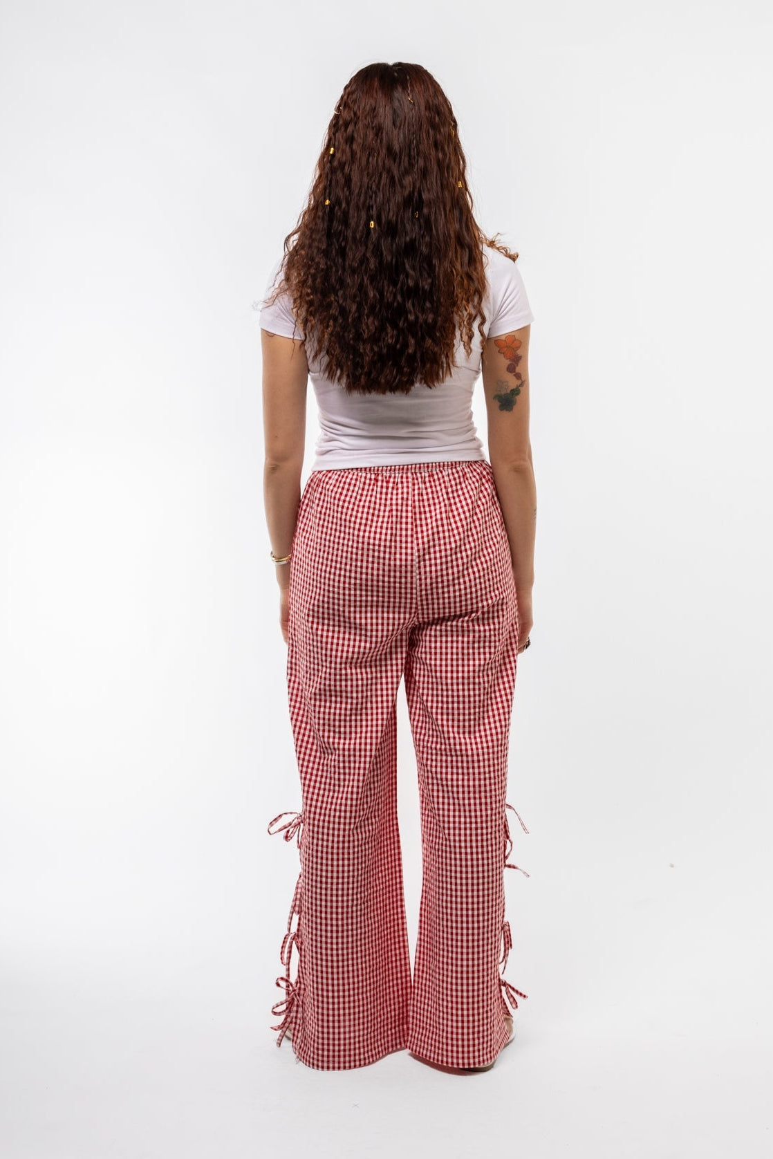 Back view of HOWDY rhinestone tee with solid back and classic short sleeves

