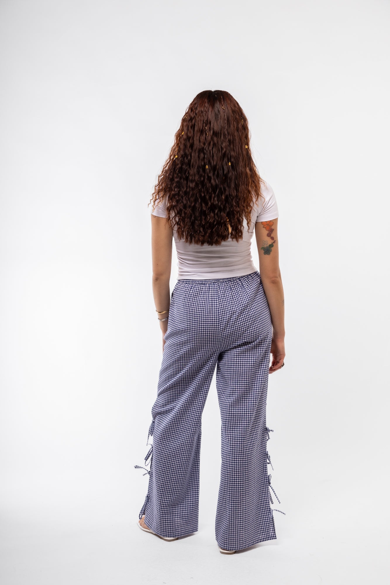 Back view of graphic tee highlighting unembellished back and relaxed everyday style

