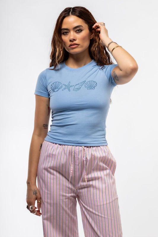 Blue Shell graphic tee front shot showcasing rhinestone-embellished shell motif and relaxed crewneck fit

