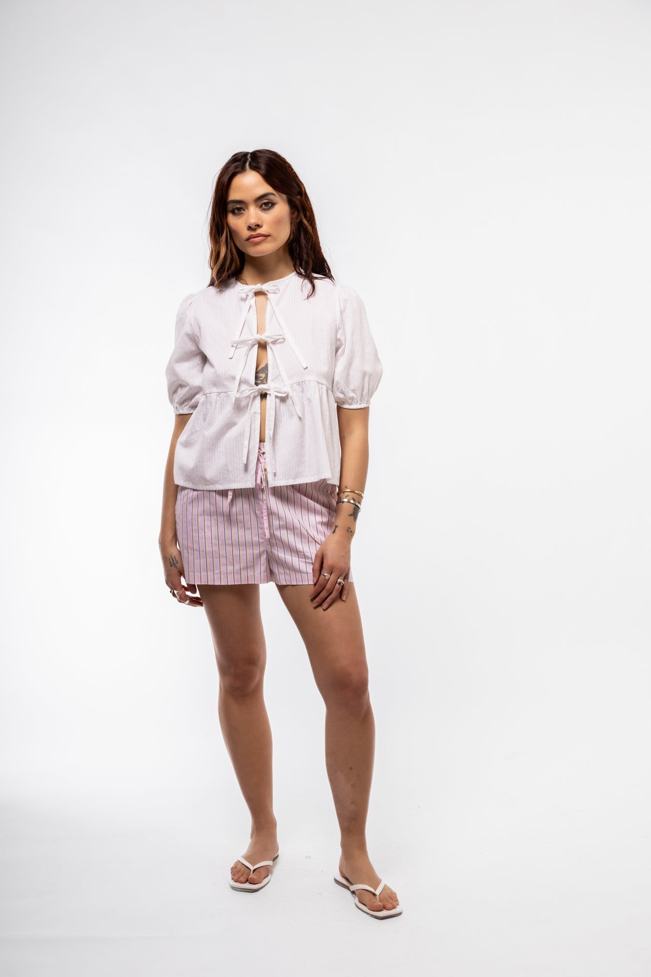 Chic front-tie blouse with voluminous puff sleeves – front angle