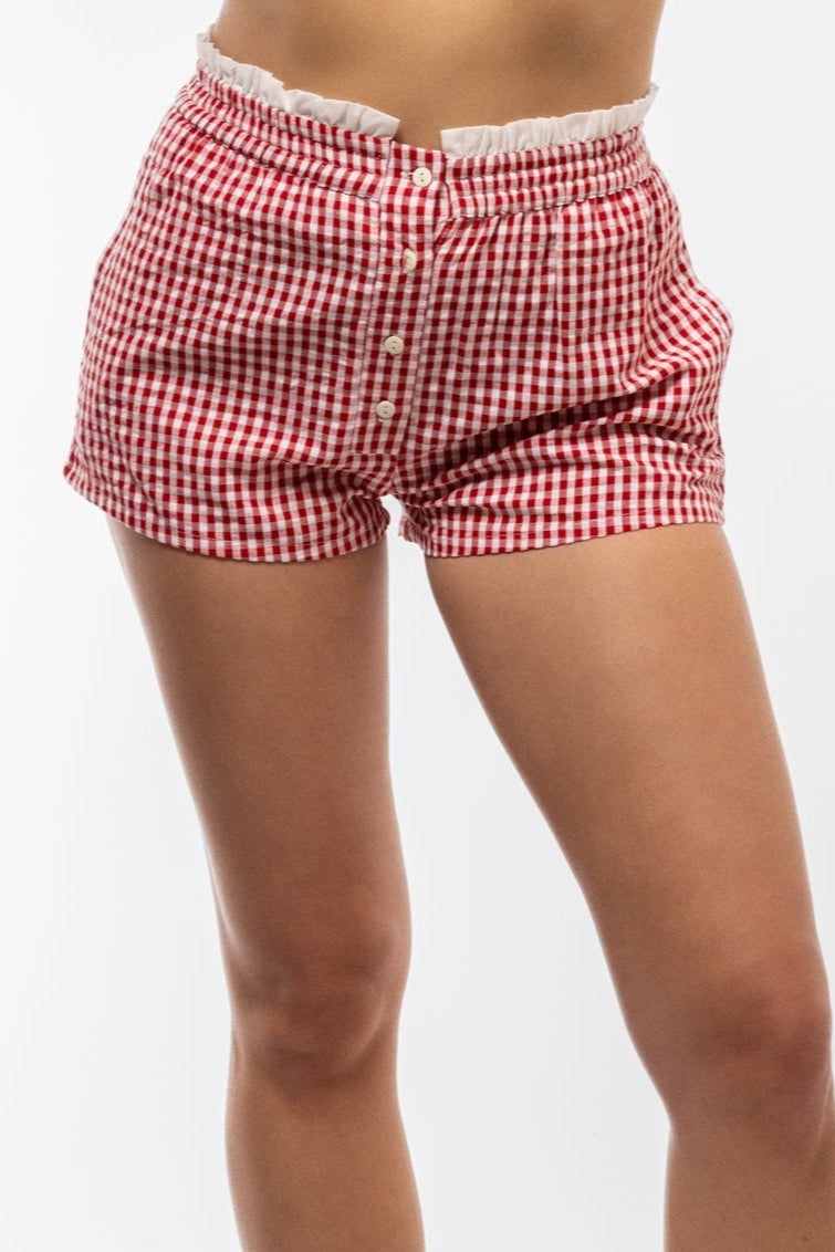 Red plaid boxer shorts with elastic waistband – front angle

