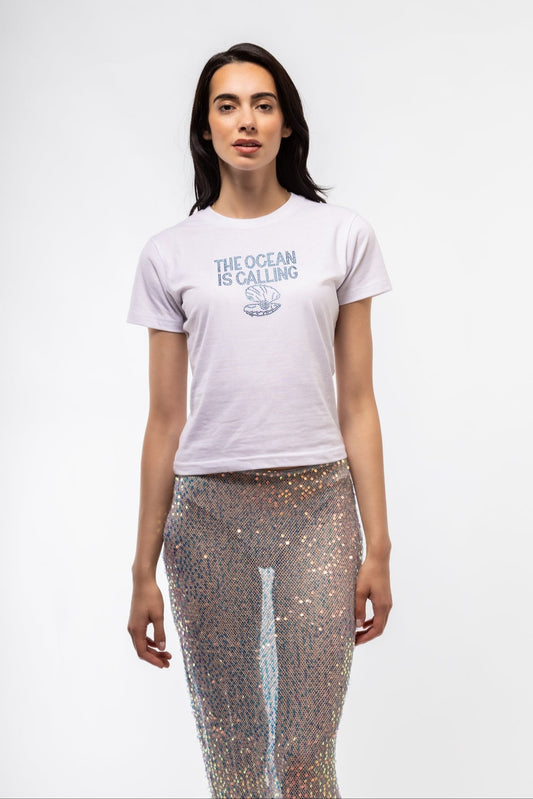 Close-up front image of rhinestone tee highlighting glistening lettering and relaxed beachwear style

