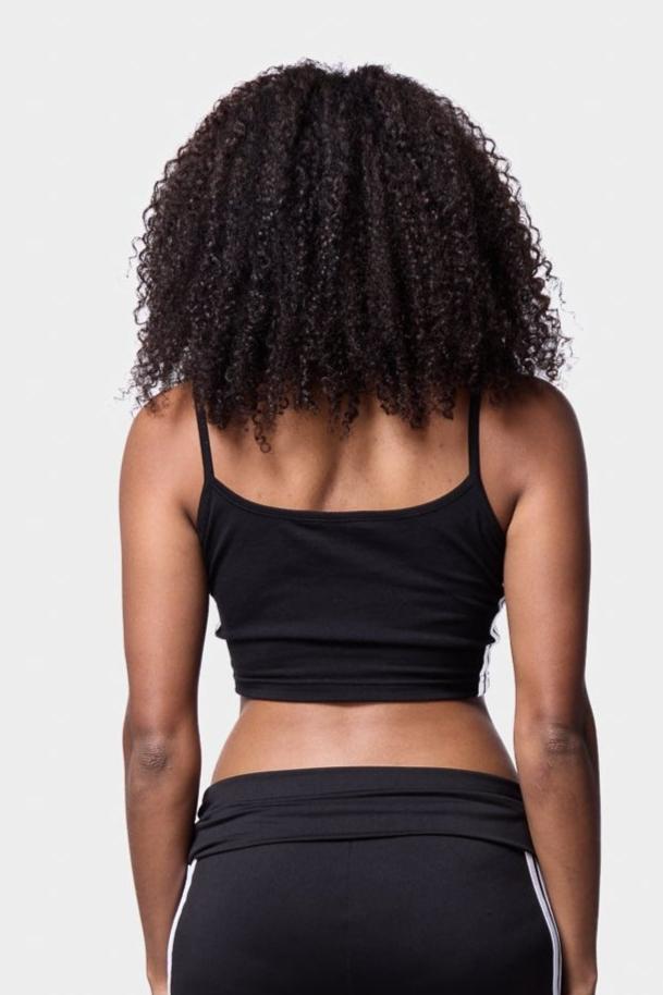 Detail of Black Stripe Cropped Cami Top - A close-up of the stripe detailing on a black cropped cami top.