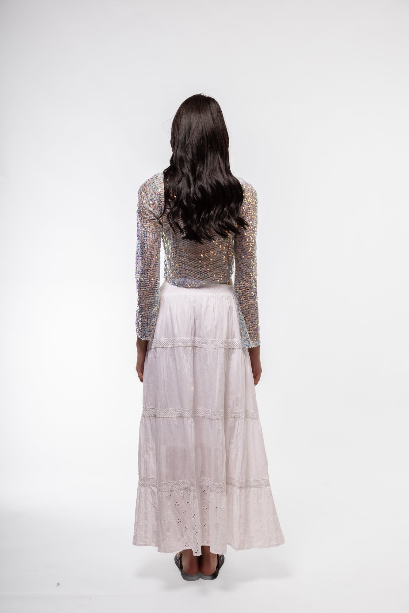 Boho-inspired back view of sequin crochet crop top


