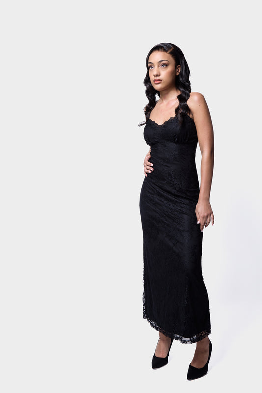 Elegant black lace midi slip dress with delicate straps and lace detailing
Chic lace midi slip dress with a soft, flowing silhouette and lace trim