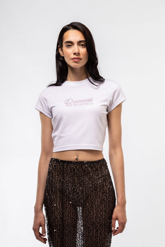 Front view of “Damsel Not in Distress” rhinestone tee featuring sparkling slogan and fitted silhouette

