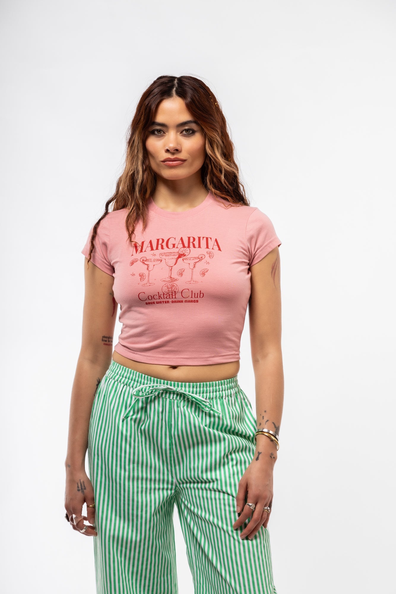 Front view of Margarita graphic tee featuring colorful margarita glass print and playful slogan

