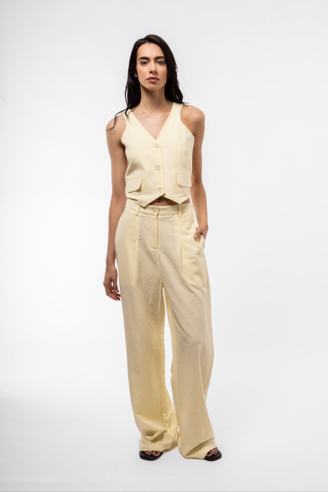Front view of Model Wearing the Lemon Yellow vest coat -waistcoat with linen blend 