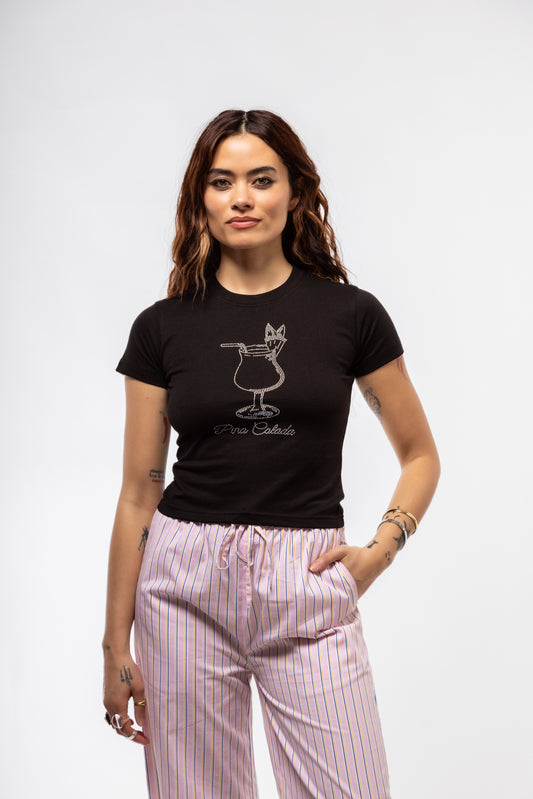 Front view of Piña Colada rhinestone tee featuring sparkling cocktail glass graphic and tropical text

