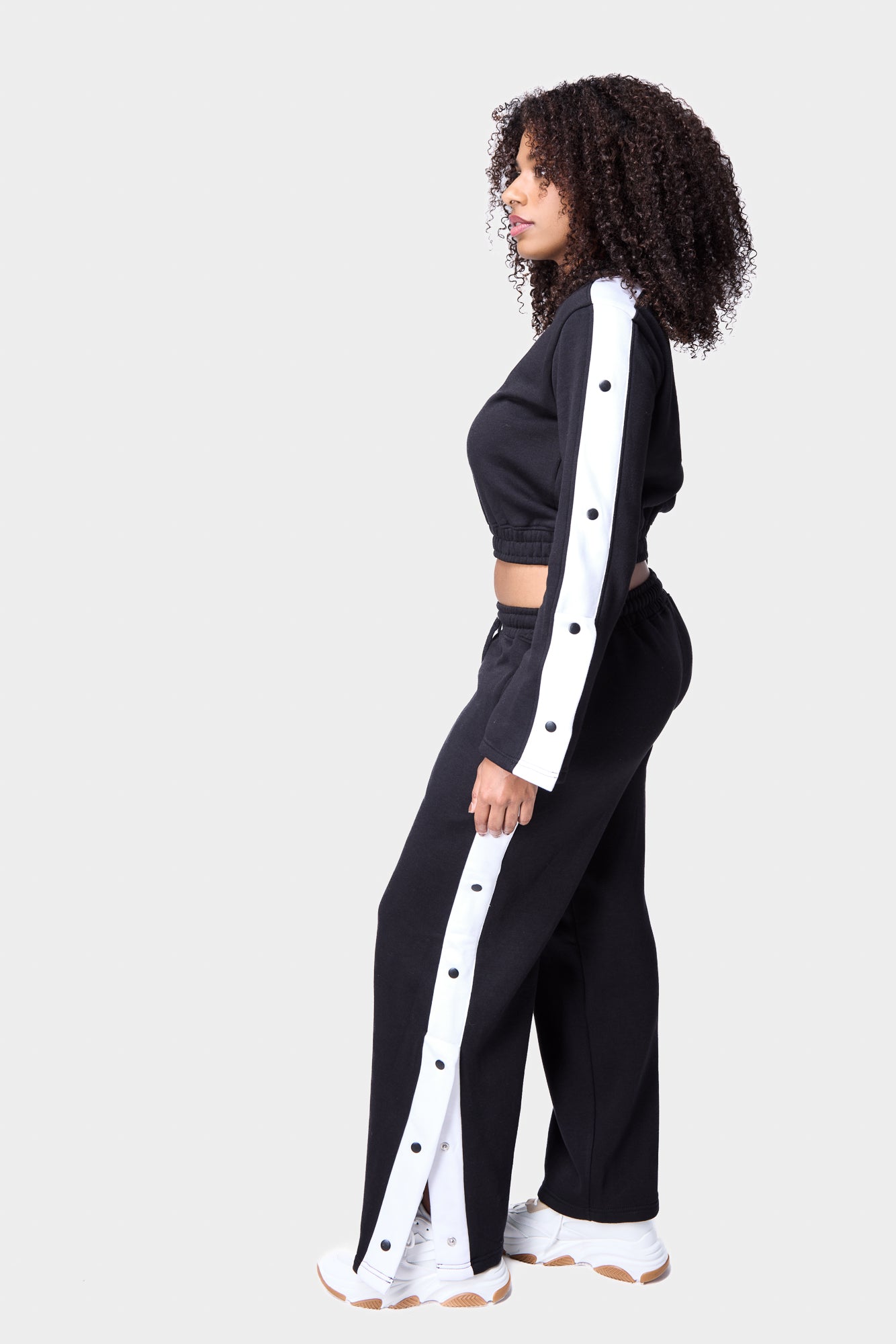 black-cropped-track-top-snap-detail