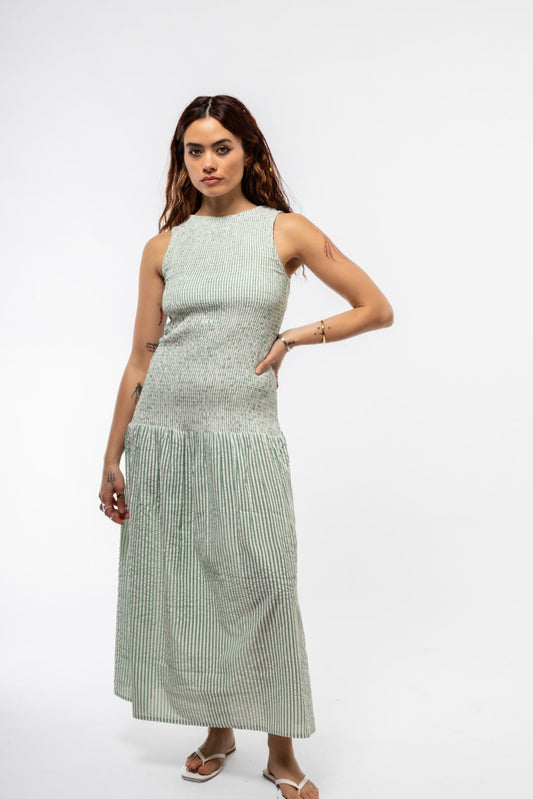 Front view of mint green shirred drop waist midi dress – summer outfit

