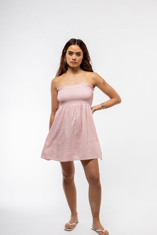 Front view of pink gingham ruched bandeau mini dress – summer style

