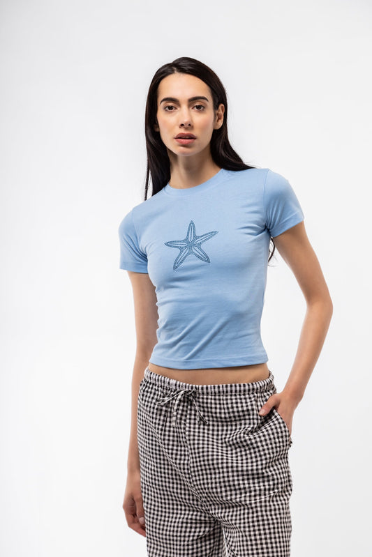 Front view of rhinestone tee featuring sparkling embellished design and classic crewneck cut

