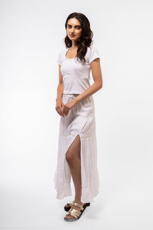 Front view of white scoop neck top with delicate white lace detail and flattering shape

