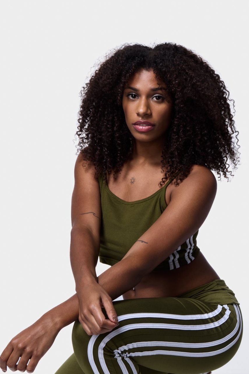 Khaki Cropped Cami Top Look - A stylish black cropped cami top with stripe design for a modern fit.
