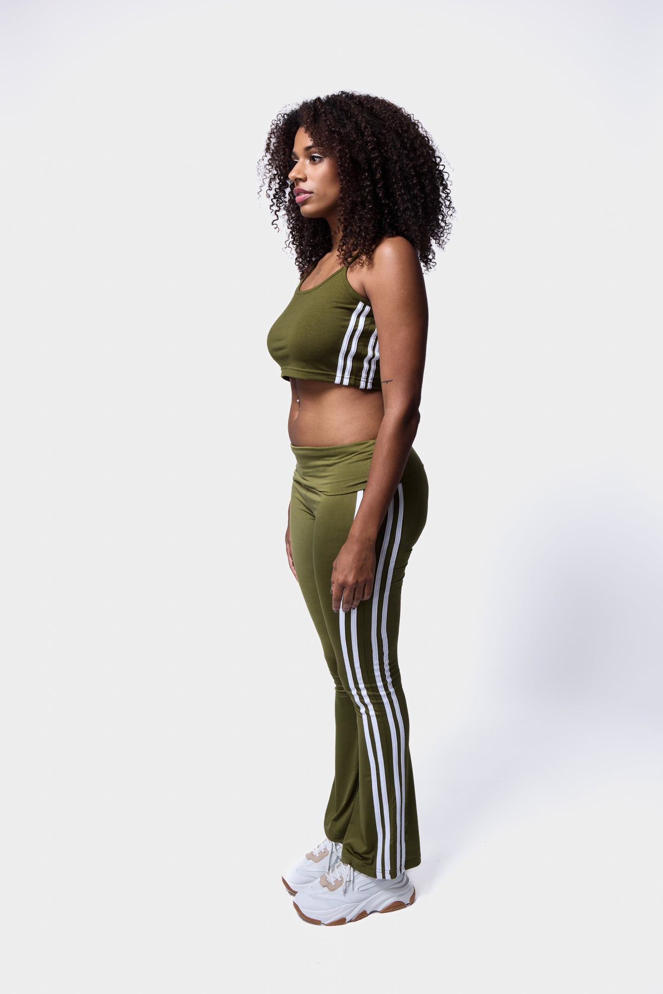 Khaki Stripe Cropped Cami Top - A view of a black cropped cami top featuring stylish side stripes.