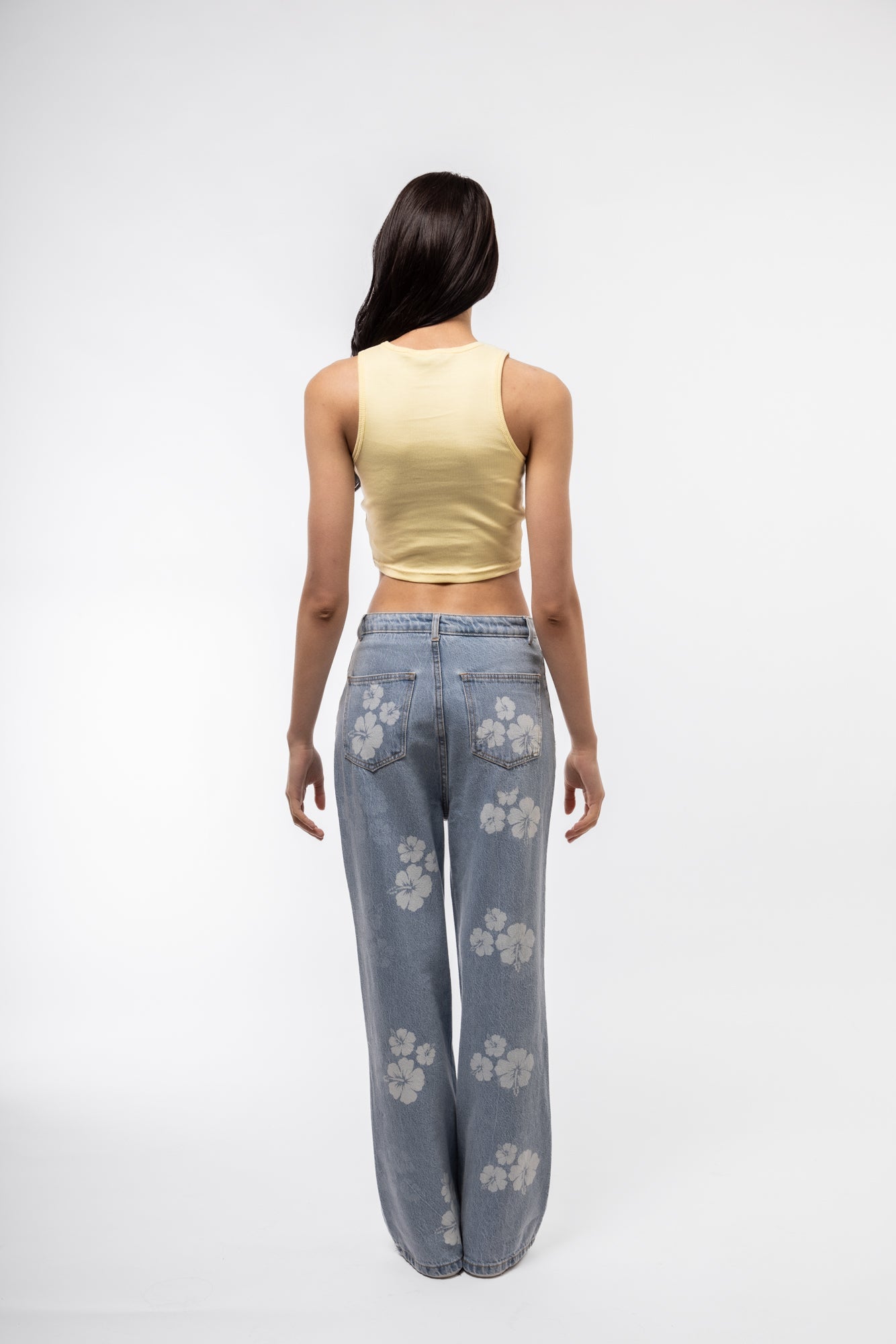 Lemon racerback top back view showing easy fit and casual styling.

