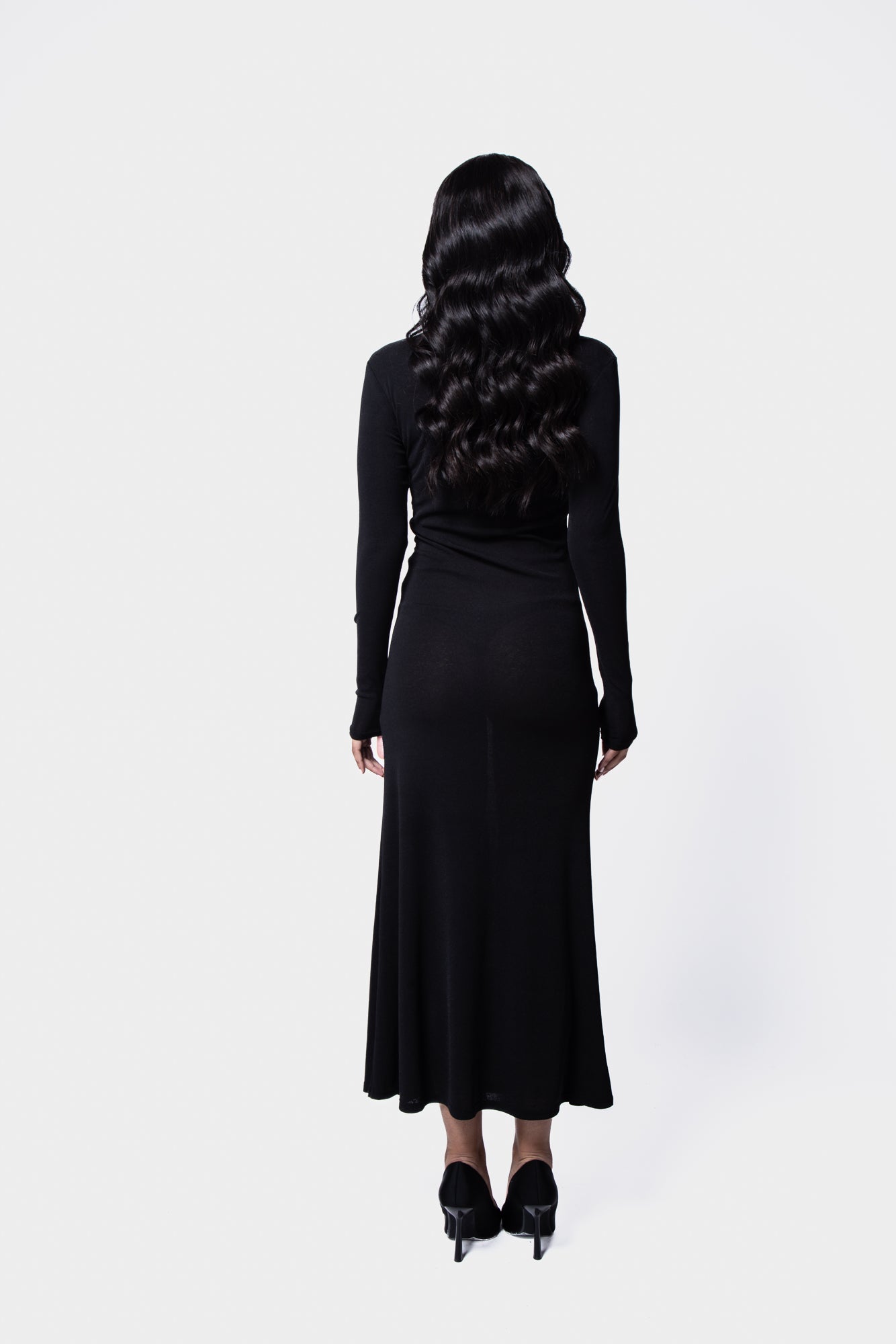 Lightweight long sleeve knit dress with a sheer, breezy style