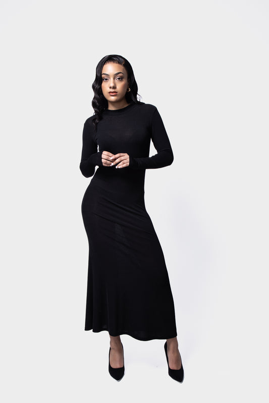Long sleeve sheer knit maxi dress perfect for layering in any season front view