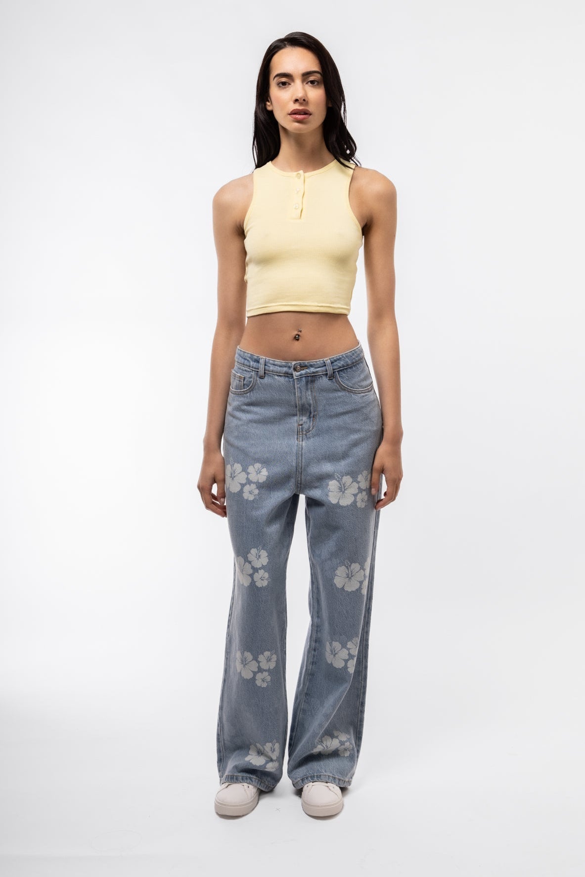 Front view of lemon yellow button placket racer top with sunny, fresh tone.


