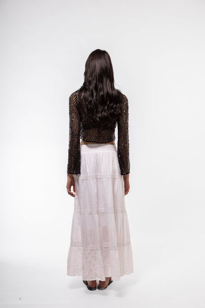 Model from the Back view of sequin crochet knit top – shimmering and breathable

