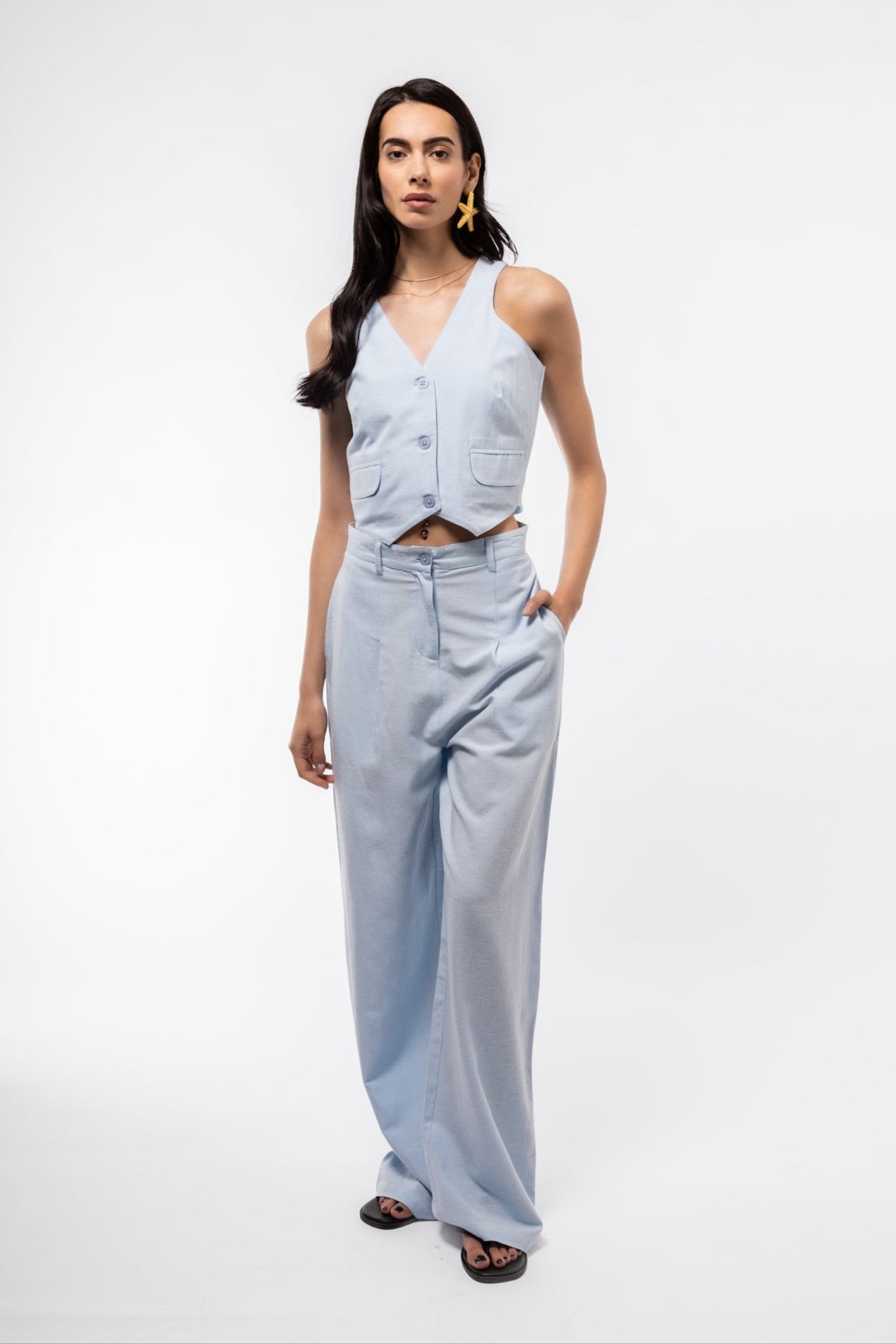 Model front view of the Light Blue Vest in cotton blend 