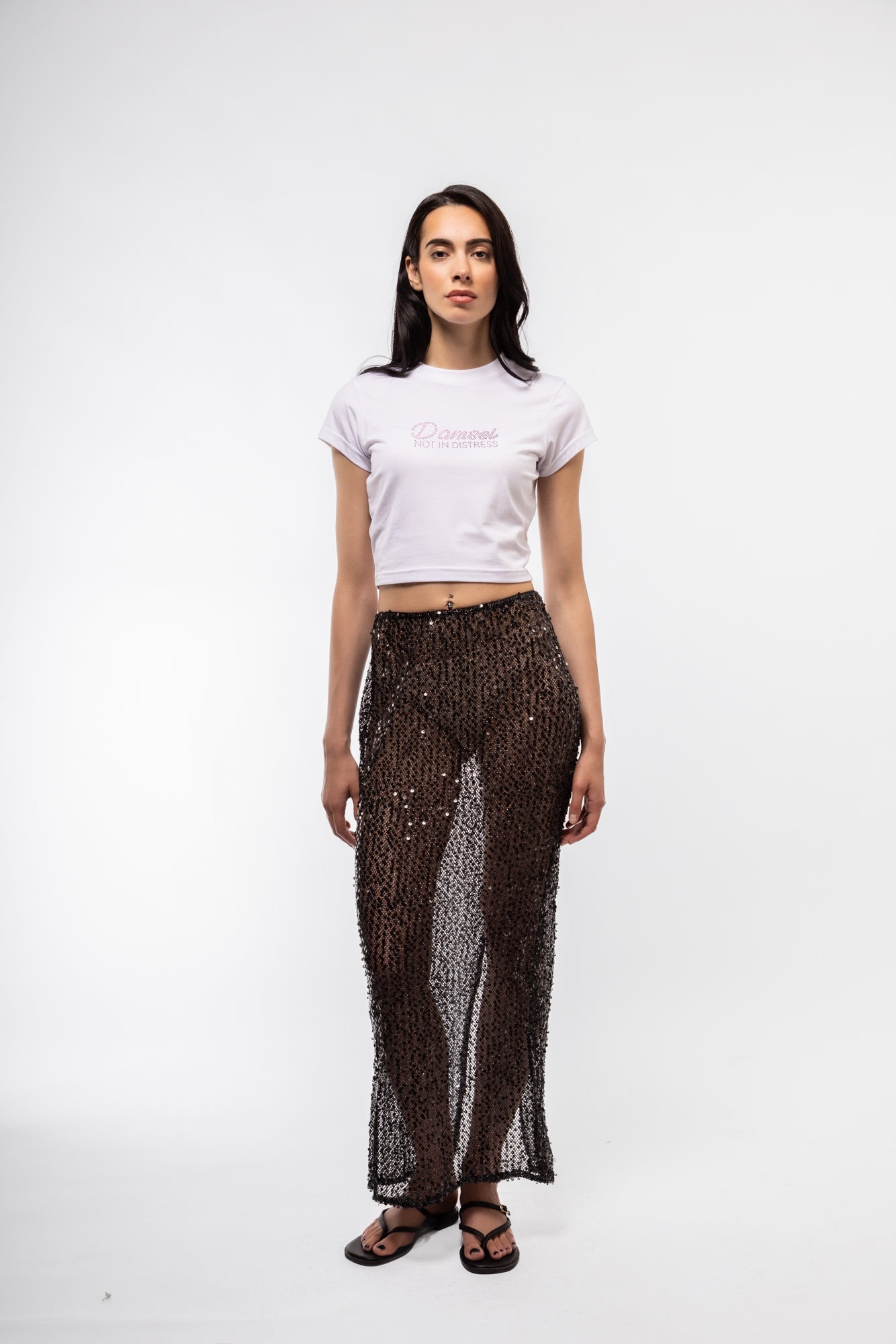 Front view of sequin knitted midi skirt – shimmering and textured

