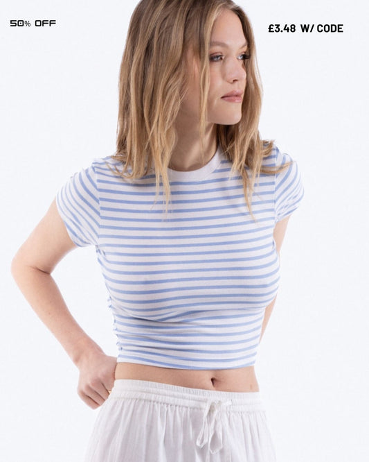 Woman wearing a blue and white striped shirt on a white background