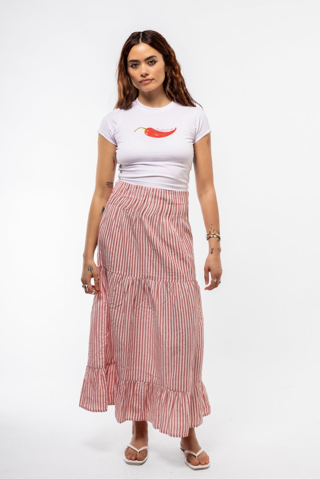 Close-up front image of spicy graphic tee highlighting bold lettering and red chili detail

